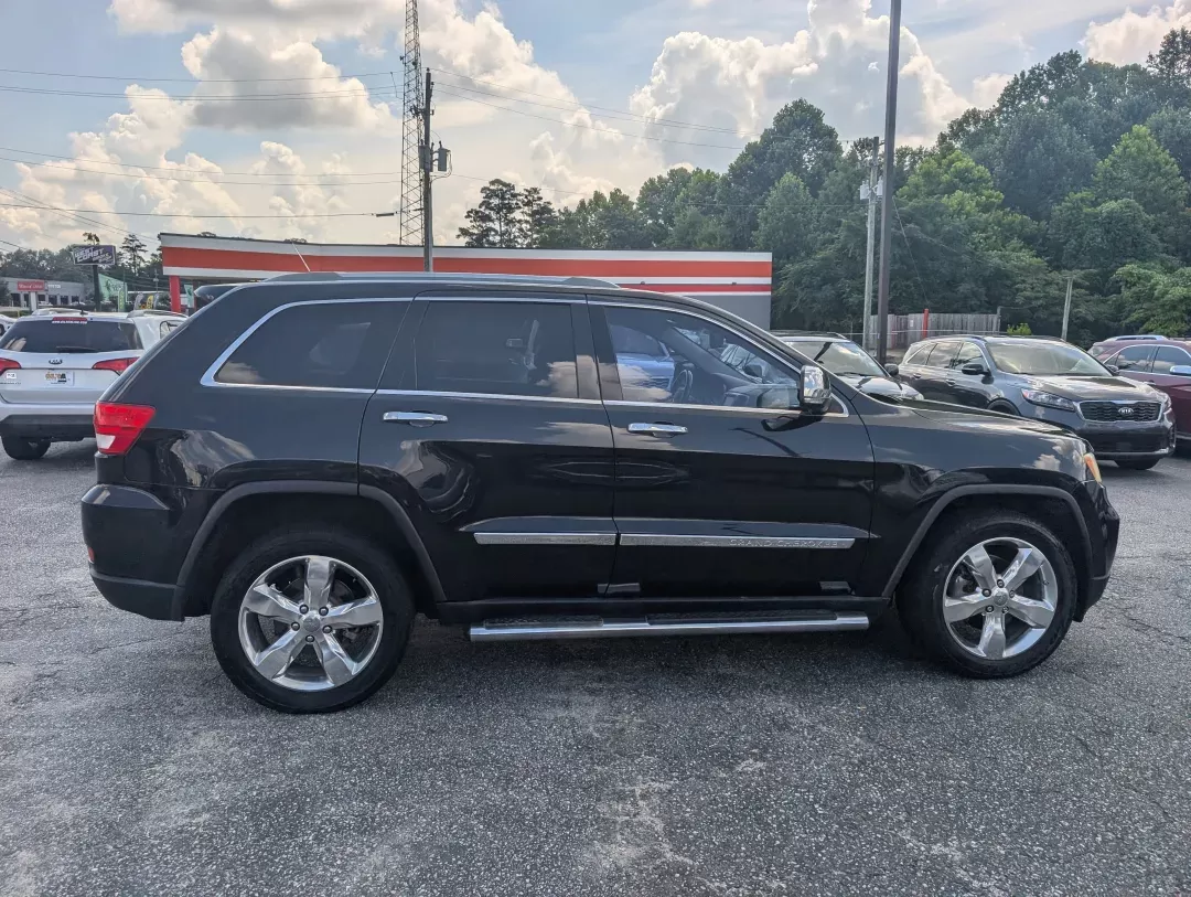 2012 /Black/New Saddle Jeep Grand Cherokee Overland Summit (1C4RJECT6CC) with an Other engine, located at 7000 Northlake Connector, Columbus, GA, 31904, (706) 987-8085, 32.524975, -84.978134 - **Conquer the Road with the 2012 Jeep Grand Cherokee Overland Summit! Ideal for Your Next Adventure!**<br /> <br /> Are you ready to elevate your driving experience? The 2012 Jeep Grand Cherokee Overland Summit is the perfect companion for those who crave adventure without sacrificing comfort. Wheth - Photo#3