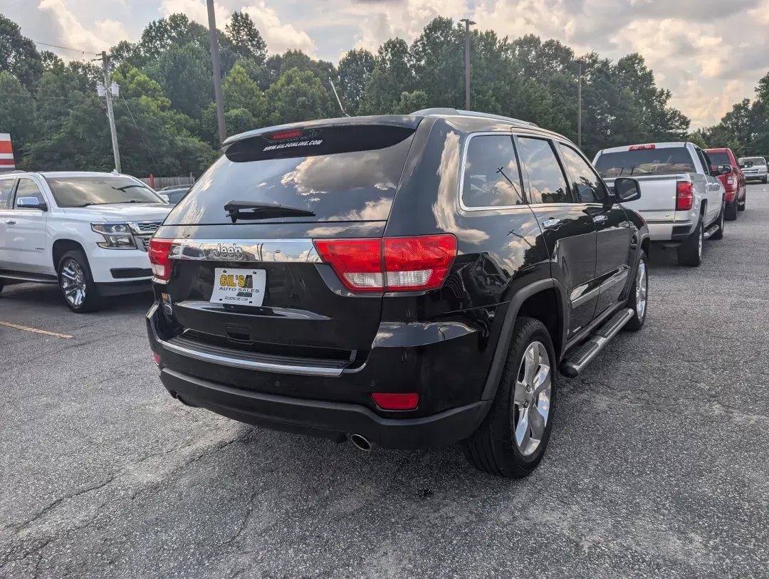 2012 /Black/New Saddle Jeep Grand Cherokee Overland Summit (1C4RJECT6CC) with an Other engine, located at 7000 Northlake Connector, Columbus, GA, 31904, (706) 987-8085, 32.524975, -84.978134 - **Conquer the Road with the 2012 Jeep Grand Cherokee Overland Summit! Ideal for Your Next Adventure!**<br /> <br /> Are you ready to elevate your driving experience? The 2012 Jeep Grand Cherokee Overland Summit is the perfect companion for those who crave adventure without sacrificing comfort. Wheth - Photo#4