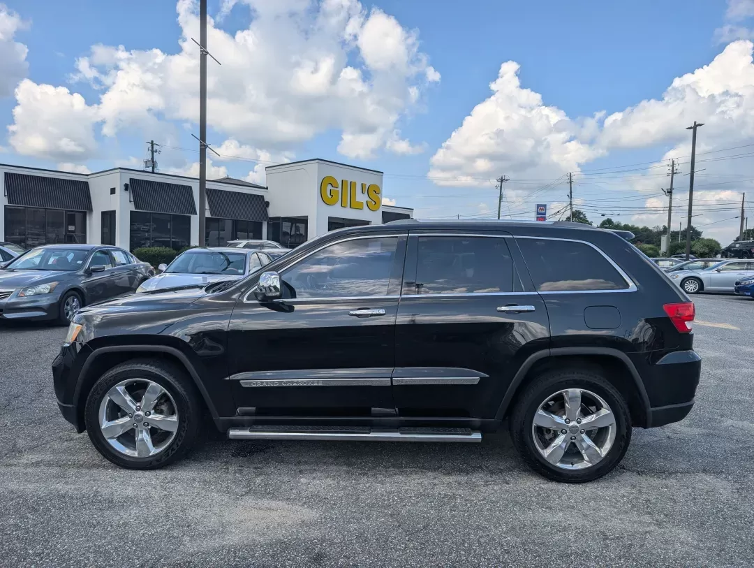 2012 /Black/New Saddle Jeep Grand Cherokee Overland Summit (1C4RJECT6CC) with an Other engine, located at 7000 Northlake Connector, Columbus, GA, 31904, (706) 987-8085, 32.524975, -84.978134 - **Conquer the Road with the 2012 Jeep Grand Cherokee Overland Summit! Ideal for Your Next Adventure!**<br /> <br /> Are you ready to elevate your driving experience? The 2012 Jeep Grand Cherokee Overland Summit is the perfect companion for those who crave adventure without sacrificing comfort. Wheth - Photo#7