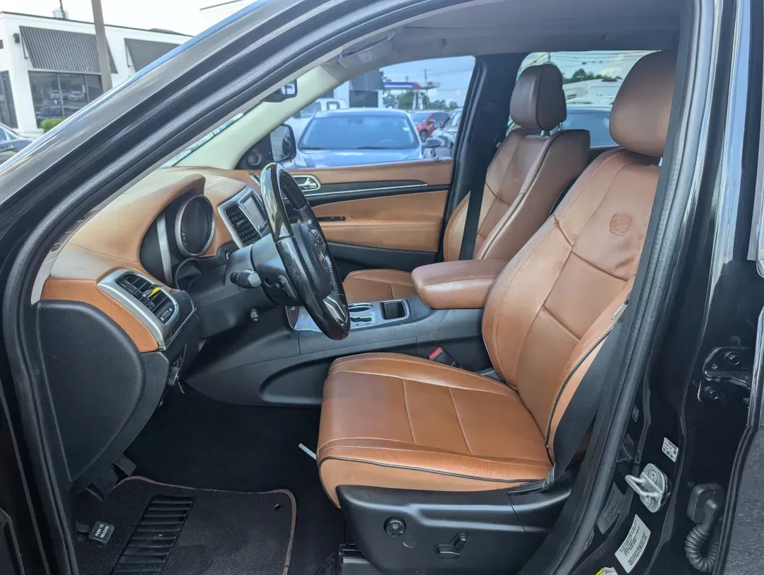 2012 /Black/New Saddle Jeep Grand Cherokee Overland Summit (1C4RJECT6CC) with an Other engine, located at 7000 Northlake Connector, Columbus, GA, 31904, (706) 987-8085, 32.524975, -84.978134 - **Conquer the Road with the 2012 Jeep Grand Cherokee Overland Summit! Ideal for Your Next Adventure!**<br /> <br /> Are you ready to elevate your driving experience? The 2012 Jeep Grand Cherokee Overland Summit is the perfect companion for those who crave adventure without sacrificing comfort. Wheth - Photo#9