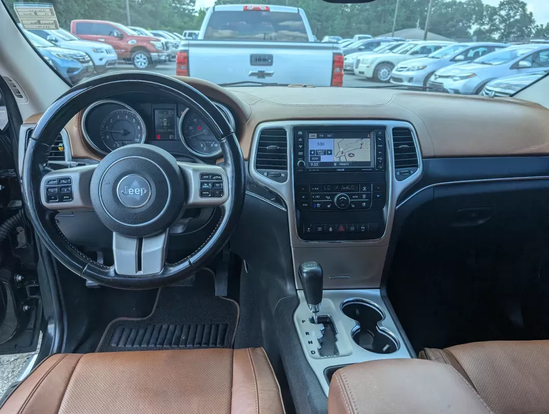 2012 /Black/New Saddle Jeep Grand Cherokee Overland Summit (1C4RJECT6CC) with an Other engine, located at 7000 Northlake Connector, Columbus, GA, 31904, (706) 987-8085, 32.524975, -84.978134 - **Conquer the Road with the 2012 Jeep Grand Cherokee Overland Summit! Ideal for Your Next Adventure!**<br /> <br /> Are you ready to elevate your driving experience? The 2012 Jeep Grand Cherokee Overland Summit is the perfect companion for those who crave adventure without sacrificing comfort. Wheth - Photo#11