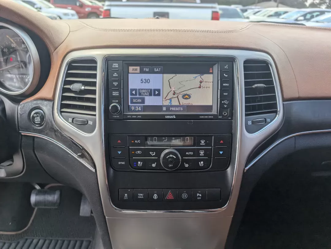 2012 /Black/New Saddle Jeep Grand Cherokee Overland Summit (1C4RJECT6CC) with an Other engine, located at 7000 Northlake Connector, Columbus, GA, 31904, (706) 987-8085, 32.524975, -84.978134 - **Conquer the Road with the 2012 Jeep Grand Cherokee Overland Summit! Ideal for Your Next Adventure!**<br /> <br /> Are you ready to elevate your driving experience? The 2012 Jeep Grand Cherokee Overland Summit is the perfect companion for those who crave adventure without sacrificing comfort. Wheth - Photo#14