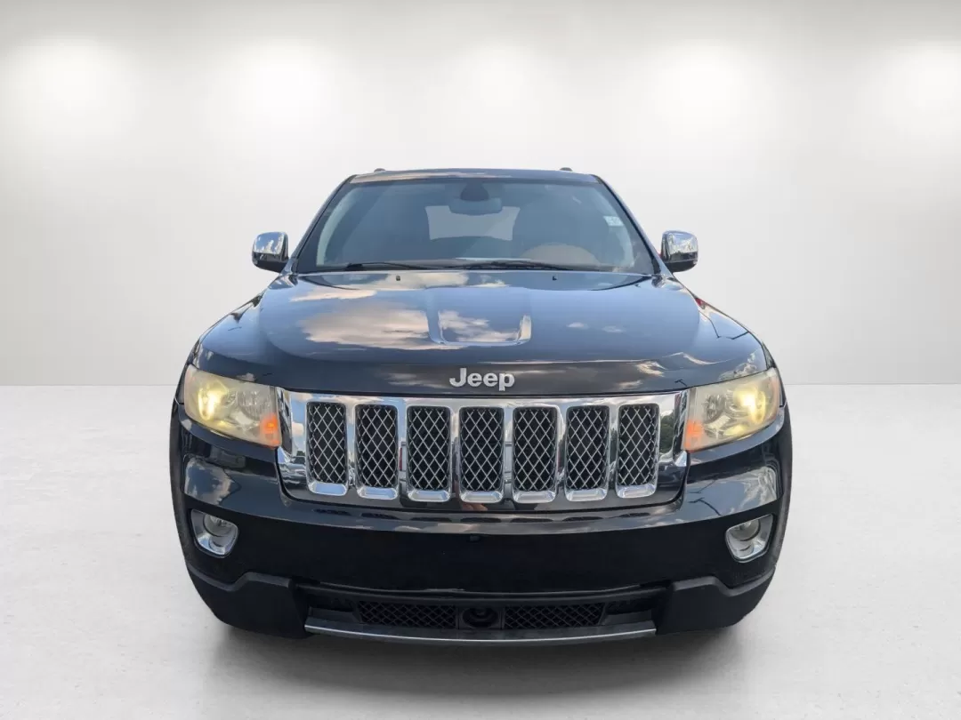 2012 /Black/New Saddle Jeep Grand Cherokee Overland Summit (1C4RJECT6CC) with an Other engine, located at 7000 Northlake Connector, Columbus, GA, 31904, (706) 987-8085, 32.524975, -84.978134 - **Conquer the Road with the 2012 Jeep Grand Cherokee Overland Summit! Ideal for Your Next Adventure!**<br /> <br /> Are you ready to elevate your driving experience? The 2012 Jeep Grand Cherokee Overland Summit is the perfect companion for those who crave adventure without sacrificing comfort. Wheth - Photo#2