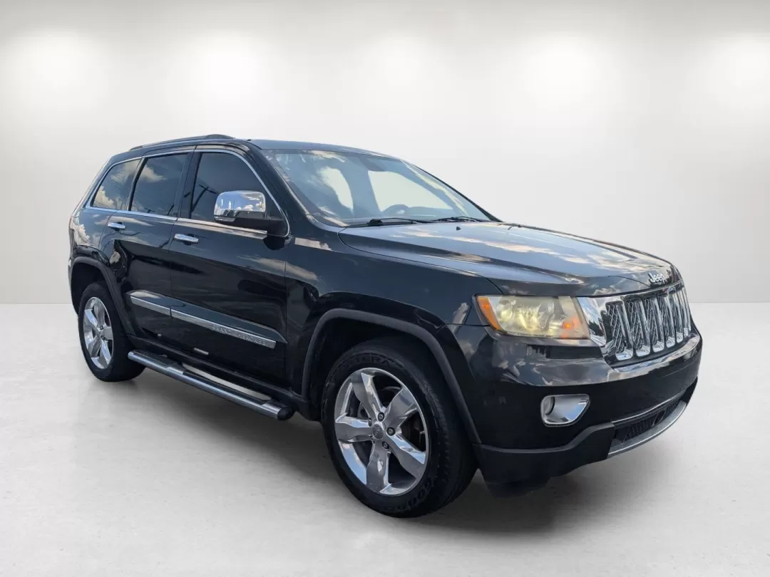 2012 /Black/New Saddle Jeep Grand Cherokee Overland Summit (1C4RJECT6CC) with an Other engine, located at 7000 Northlake Connector, Columbus, GA, 31904, (706) 987-8085, 32.524975, -84.978134 - **Conquer the Road with the 2012 Jeep Grand Cherokee Overland Summit! Ideal for Your Next Adventure!**<br /> <br /> Are you ready to elevate your driving experience? The 2012 Jeep Grand Cherokee Overland Summit is the perfect companion for those who crave adventure without sacrificing comfort. Wheth - Photo#3