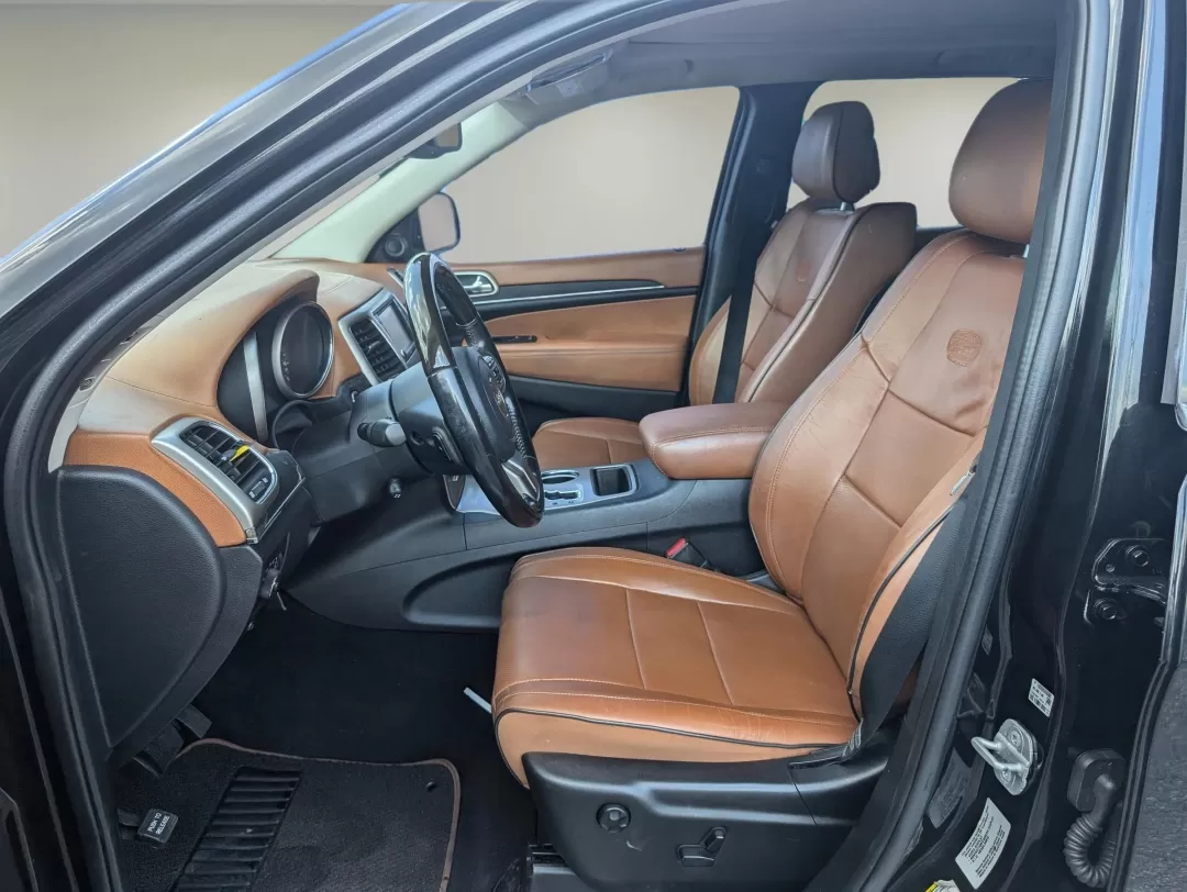 2012 /Black/New Saddle Jeep Grand Cherokee Overland Summit (1C4RJECT6CC) with an Other engine, located at 7000 Northlake Connector, Columbus, GA, 31904, (706) 987-8085, 32.524975, -84.978134 - **Conquer the Road with the 2012 Jeep Grand Cherokee Overland Summit! Ideal for Your Next Adventure!**<br /> <br /> Are you ready to elevate your driving experience? The 2012 Jeep Grand Cherokee Overland Summit is the perfect companion for those who crave adventure without sacrificing comfort. Wheth - Photo#10