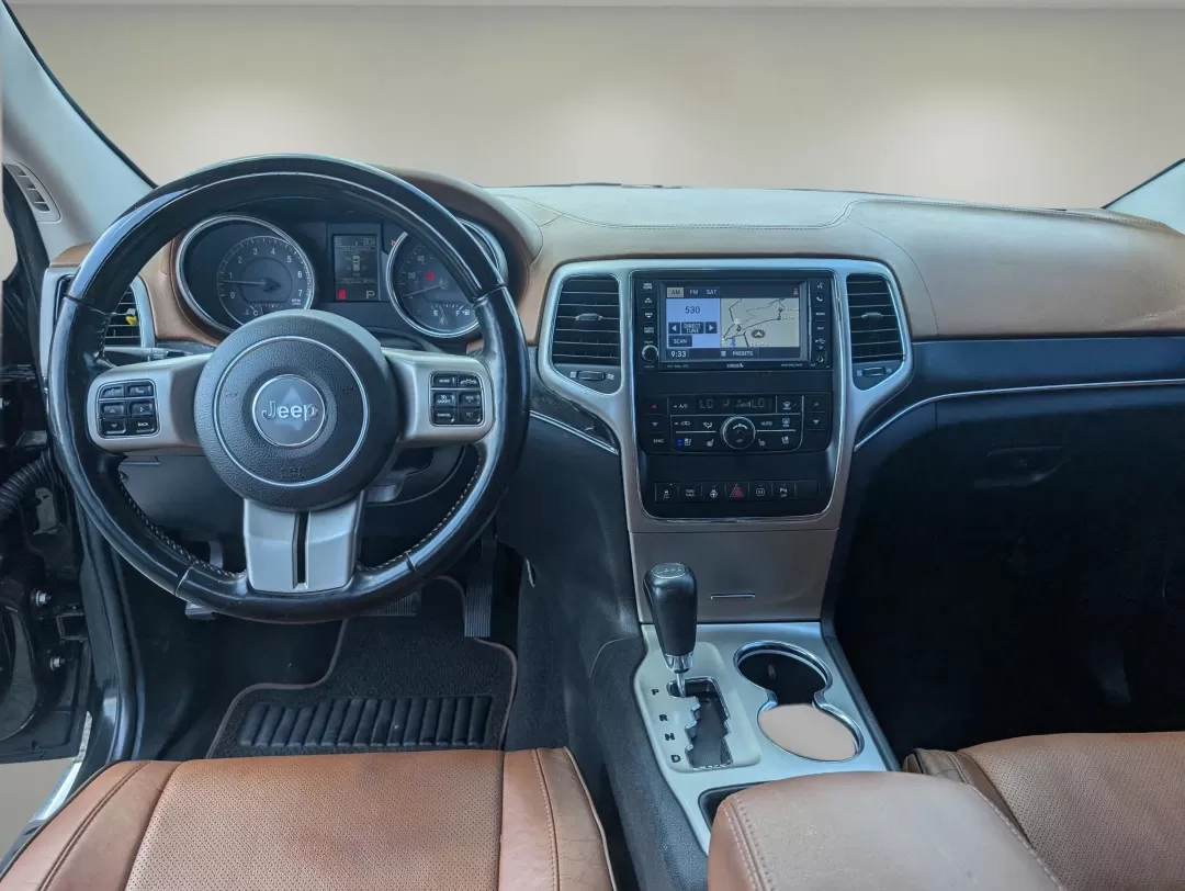 2012 /Black/New Saddle Jeep Grand Cherokee Overland Summit (1C4RJECT6CC) with an Other engine, located at 7000 Northlake Connector, Columbus, GA, 31904, (706) 987-8085, 32.524975, -84.978134 - **Conquer the Road with the 2012 Jeep Grand Cherokee Overland Summit! Ideal for Your Next Adventure!**<br /> <br /> Are you ready to elevate your driving experience? The 2012 Jeep Grand Cherokee Overland Summit is the perfect companion for those who crave adventure without sacrificing comfort. Wheth - Photo#12