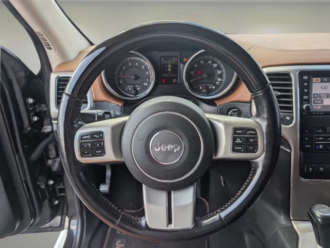 2012 /Black/New Saddle Jeep Grand Cherokee Overland Summit (1C4RJECT6CC) with an Other engine, located at 7000 Northlake Connector, Columbus, GA, 31904, (706) 987-8085, 32.524975, -84.978134 - **Conquer the Road with the 2012 Jeep Grand Cherokee Overland Summit! Ideal for Your Next Adventure!**<br /> <br /> Are you ready to elevate your driving experience? The 2012 Jeep Grand Cherokee Overland Summit is the perfect companion for those who crave adventure without sacrificing comfort. Wheth - Photo#16
