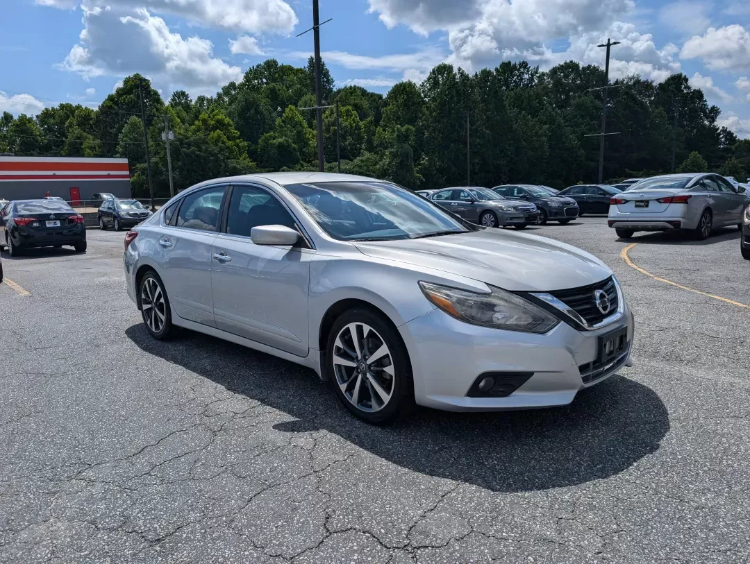 2017 /Sport Interior Nissan Altima 2.5 SR (1N4AL3AP3HC) with an Other engine, located at 3959 U.S. 80 W, Phenix City, AL, 36870, (334) 297-4885, 32.469296, -85.135185 - **Discover Your New Adventure with the 2017 Nissan Altima 2.5 SR at Gils Auto!**<br /> <br /> Are you in search of a reliable vehicle that perfectly balances style, performance, and practicality? Look no further than the 2017 Nissan Altima 2.5 SR, available now at Gils Auto in Phenix City, AL! This - Photo#2