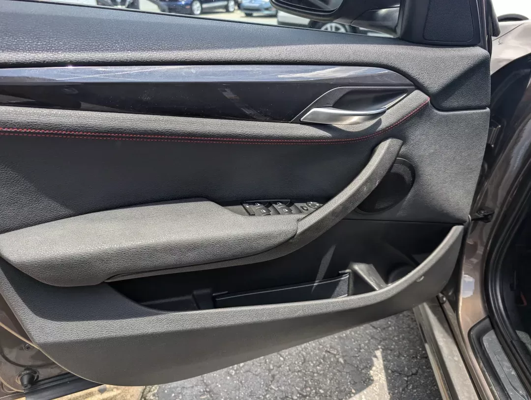 2014 BMW X1 xDrive28i (WBAVL1C56EV) with an Other engine, located at 3959 U.S. 80 W, Phenix City, AL, 36870, (334) 297-4885, 32.469296, -85.135185 - **Discover the Ultimate Blend of Style and Versatility with the 2014 BMW X1 xDrive28i at Gils Auto!**<br /> <br /> Are you in the market for a vehicle that's not just a mode of transport but a lifestyle upgrade? Whether you're navigating the daily hustle as a commuter, embarking on weekend adventure - Photo#9