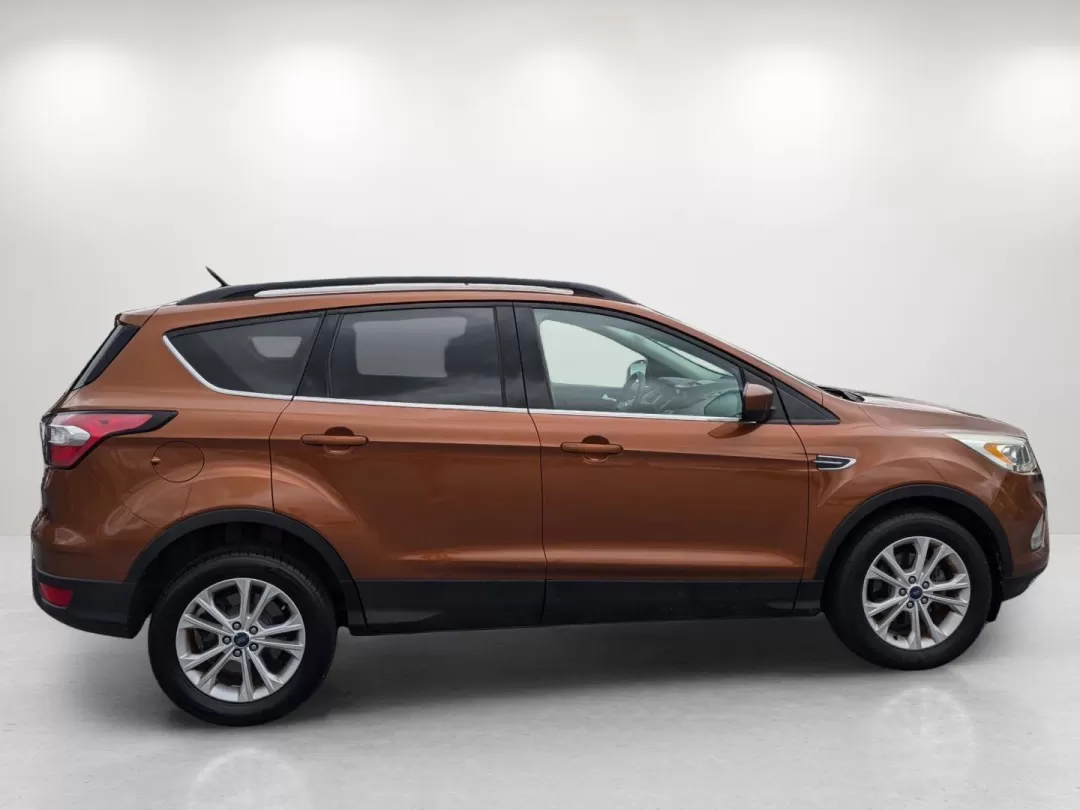2017 Ford Escape SE (1FMCU0GD7HU) with an Other engine, located at 3959 U.S. 80 W, Phenix City, AL, 36870, (334) 297-4885, 32.469296, -85.135185 - **Discover Your Next Adventure with the 2017 Ford Escape SE at Gils Auto in Phenix City, AL!** <br /> <br /> Are you searching for the perfect SUV to elevate your lifestyle? Look no further than the stunning 2017 Ford Escape SE, meticulously designed for families, commuters, and adventure-seekers al - Photo#4