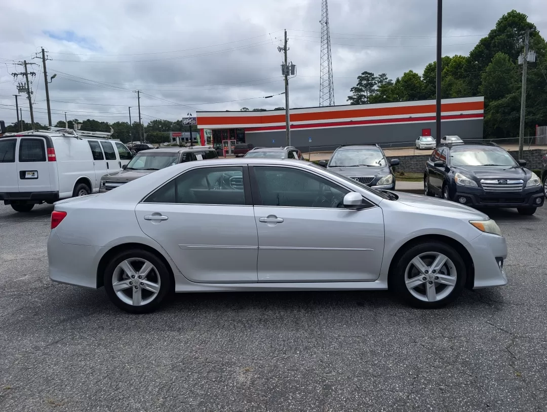 2012 Toyota Camry SE (4T1BF1FK3CU) with an Other engine, located at 3959 U.S. 80 W, Phenix City, AL, 36870, (334) 297-4885, 32.469296, -85.135185 - Experience the perfect blend of reliability and comfort with the 2012 Toyota Camry, now available at Gils Auto in Phenix City, AL. This sedan is an ideal choice for budget-conscious buyers seeking a dependable vehicle for daily commutes or family outings. With its spacious interior and fuel-efficien - Photo#3