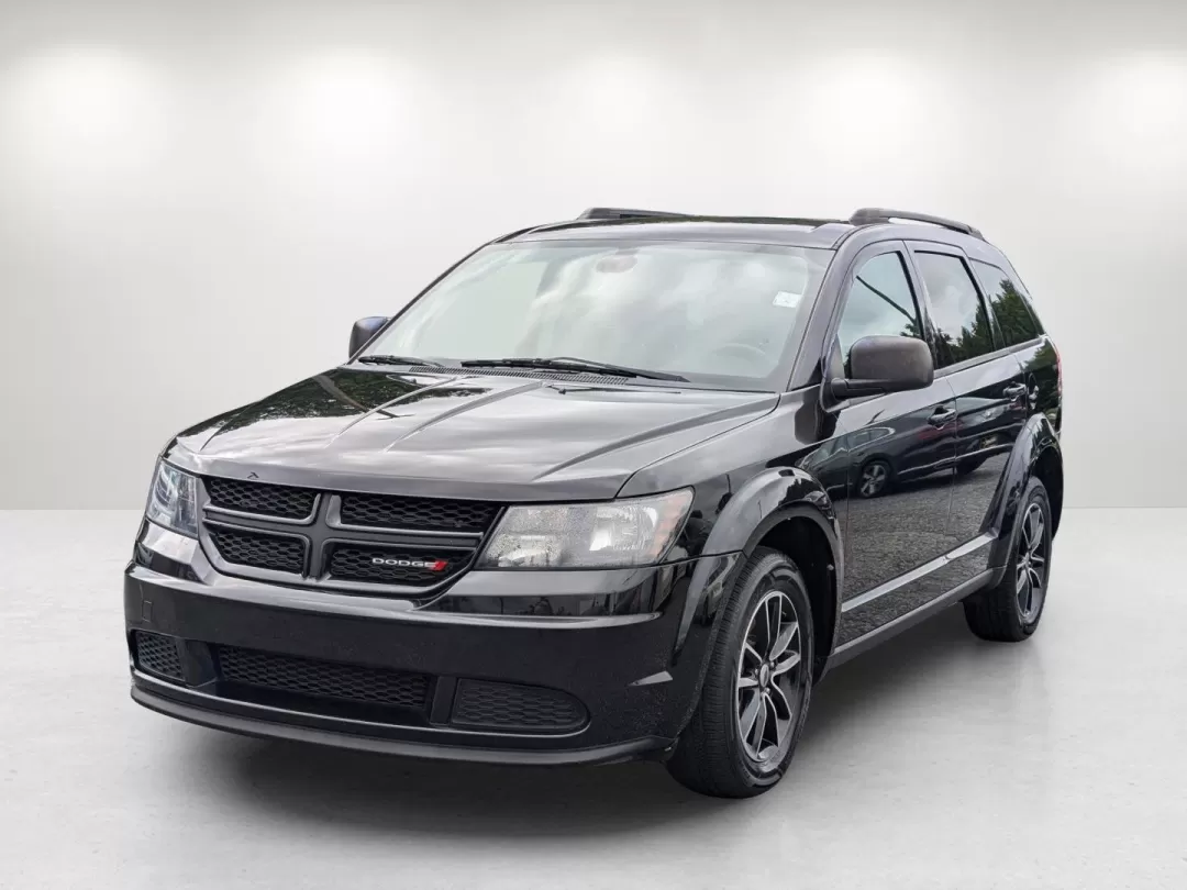 2018 /Black Dodge Journey SE (3C4PDCAB7JT) with an Other engine, located at 3959 U.S. 80 W, Phenix City, AL, 36870, (334) 297-4885, 32.469296, -85.135185 - Are you ready to elevate your family road trips or weekend adventures? Look no further than this stunning 2018 Dodge Journey SE, the perfect SUV for active lifestyles and growing families! With seats for up to seven and ample cargo space, this vehicle effortlessly blends comfort and versatility, mak - Photo#1