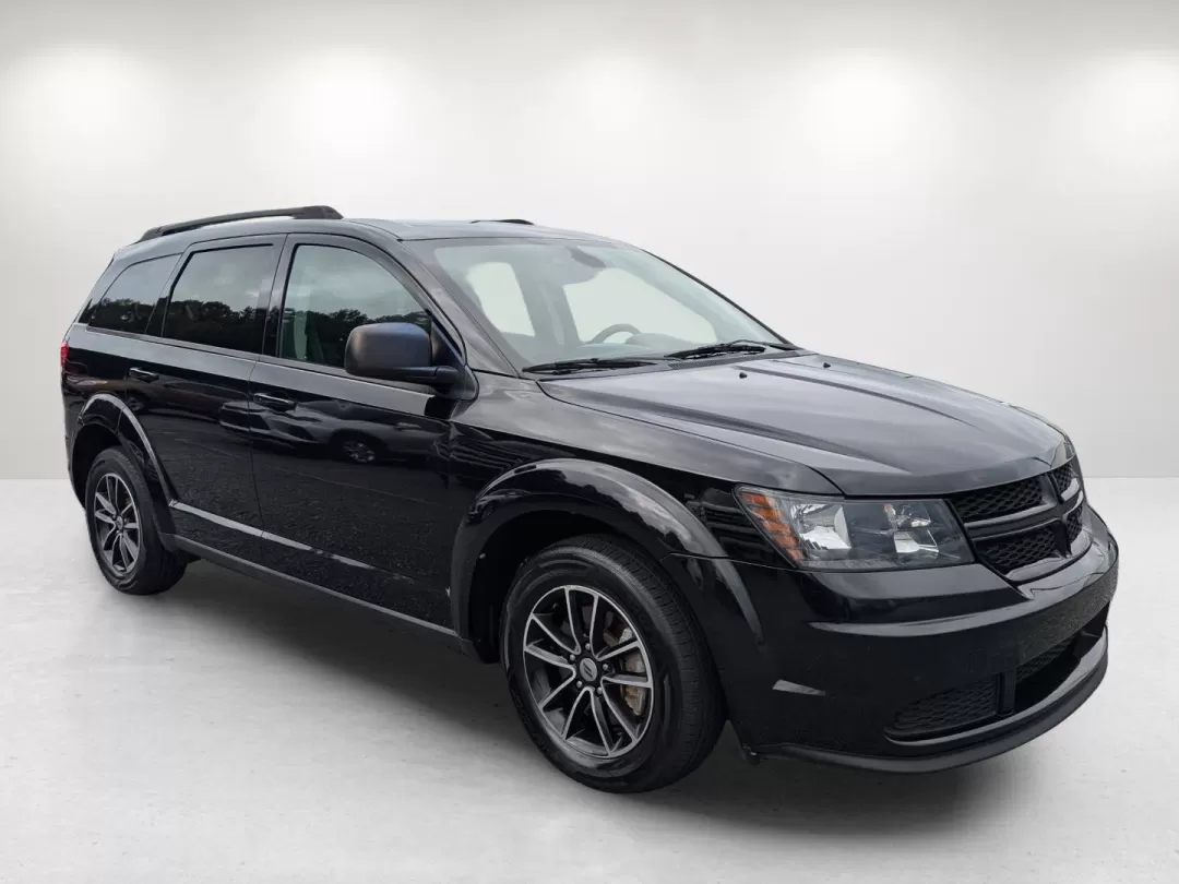 2018 /Black Dodge Journey SE (3C4PDCAB7JT) with an Other engine, located at 3959 U.S. 80 W, Phenix City, AL, 36870, (334) 297-4885, 32.469296, -85.135185 - Are you ready to elevate your family road trips or weekend adventures? Look no further than this stunning 2018 Dodge Journey SE, the perfect SUV for active lifestyles and growing families! With seats for up to seven and ample cargo space, this vehicle effortlessly blends comfort and versatility, mak - Photo#3