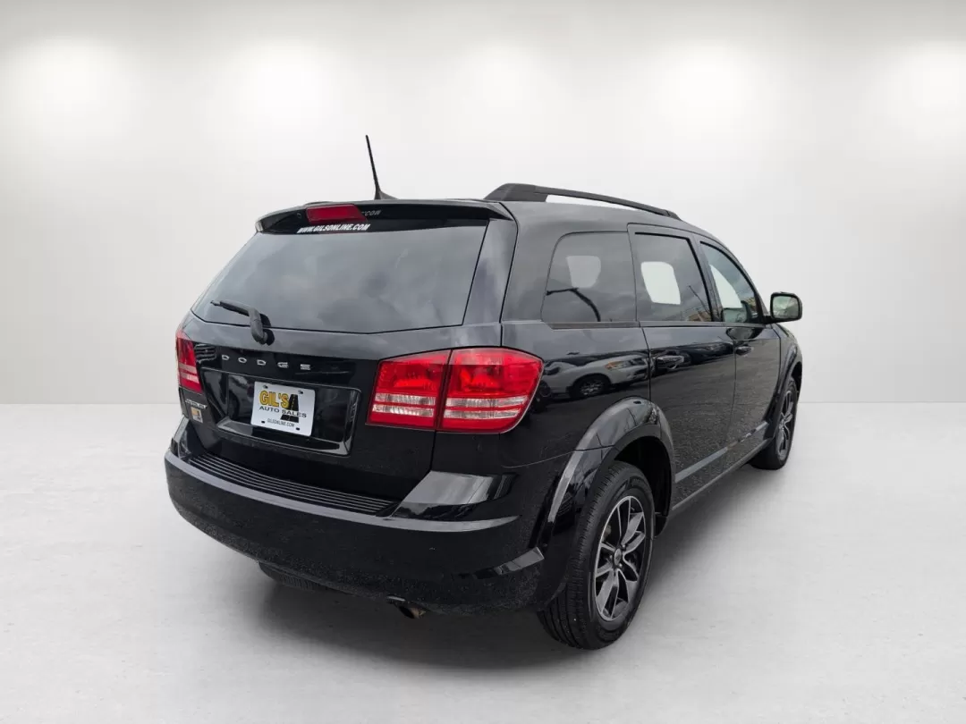 2018 /Black Dodge Journey SE (3C4PDCAB7JT) with an Other engine, located at 3959 U.S. 80 W, Phenix City, AL, 36870, (334) 297-4885, 32.469296, -85.135185 - Are you ready to elevate your family road trips or weekend adventures? Look no further than this stunning 2018 Dodge Journey SE, the perfect SUV for active lifestyles and growing families! With seats for up to seven and ample cargo space, this vehicle effortlessly blends comfort and versatility, mak - Photo#5