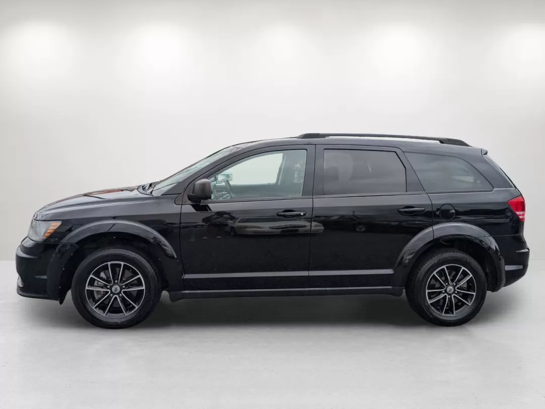 2018 /Black Dodge Journey SE (3C4PDCAB7JT) with an Other engine, located at 3959 U.S. 80 W, Phenix City, AL, 36870, (334) 297-4885, 32.469296, -85.135185 - Are you ready to elevate your family road trips or weekend adventures? Look no further than this stunning 2018 Dodge Journey SE, the perfect SUV for active lifestyles and growing families! With seats for up to seven and ample cargo space, this vehicle effortlessly blends comfort and versatility, mak - Photo#8