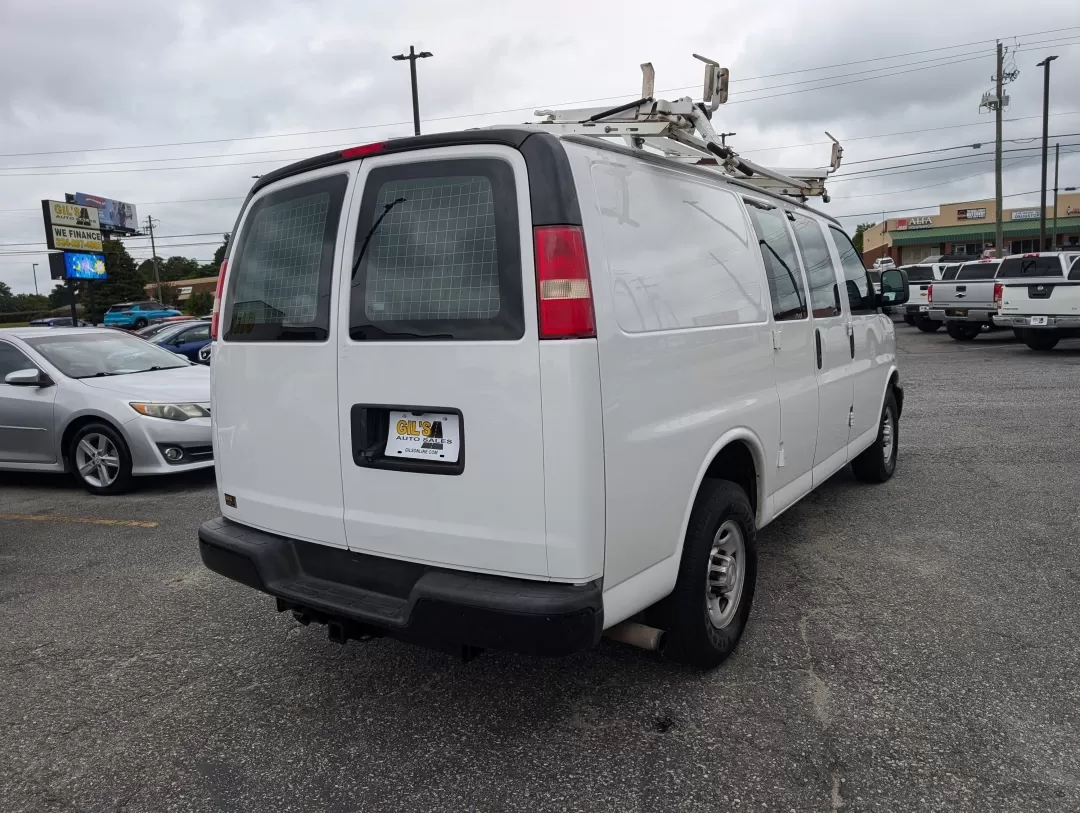 2015 /Medium Pewter Chevrolet Express Cargo Van (1GCWGFCF1F1) with an Other engine, located at 3959 U.S. 80 W, Phenix City, AL, 36870, (334) 297-4885, 32.469296, -85.135185 - Are you in the market for a reliable vehicle that can tackle tough jobs while providing you with the comfort and tech features you need? Look no further than this 2015 Chevrolet Express Cargo Van, available at Gils Auto in Phenix City, AL. This full-size cargo van is not just a vehicle; it's a versa - Photo#4