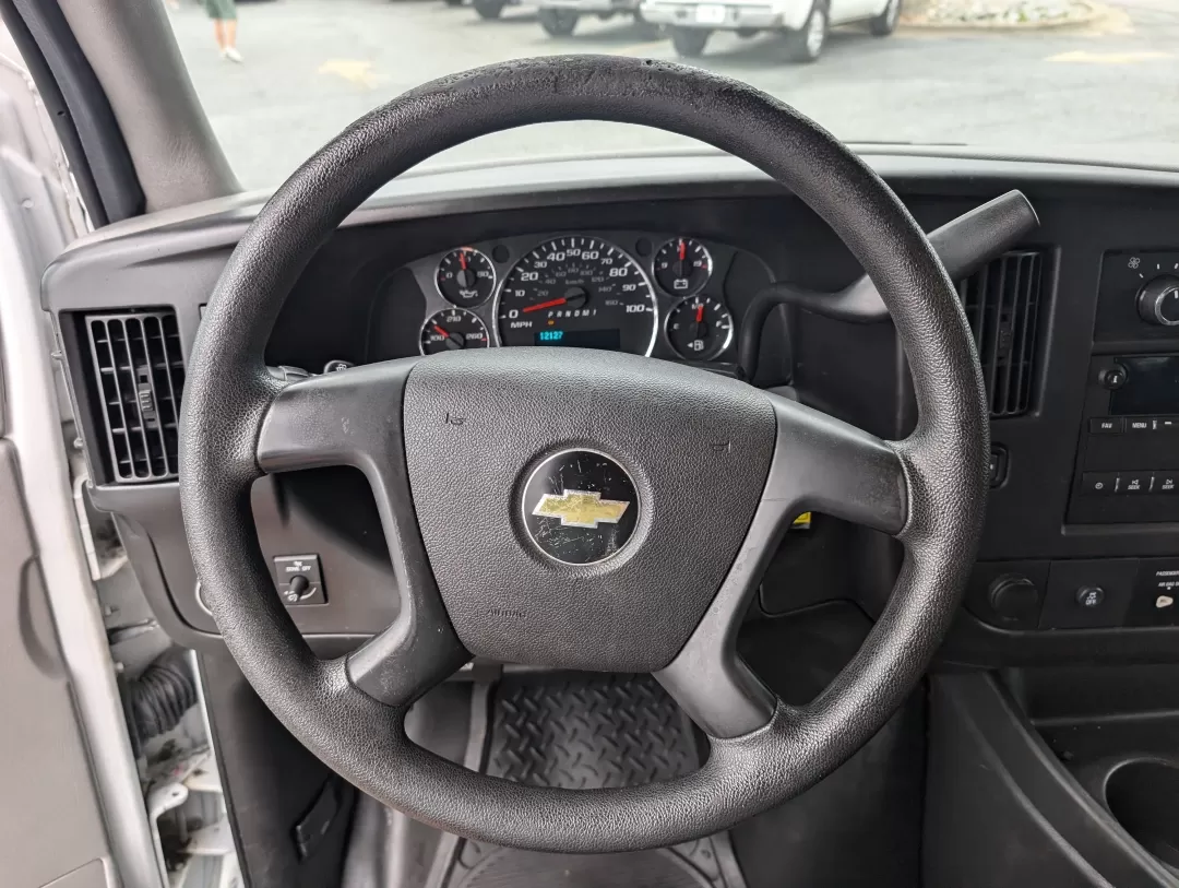 2015 /Medium Pewter Chevrolet Express Cargo Van (1GCWGFCF1F1) with an Other engine, located at 3959 U.S. 80 W, Phenix City, AL, 36870, (334) 297-4885, 32.469296, -85.135185 - Are you in the market for a reliable vehicle that can tackle tough jobs while providing you with the comfort and tech features you need? Look no further than this 2015 Chevrolet Express Cargo Van, available at Gils Auto in Phenix City, AL. This full-size cargo van is not just a vehicle; it's a versa - Photo#16