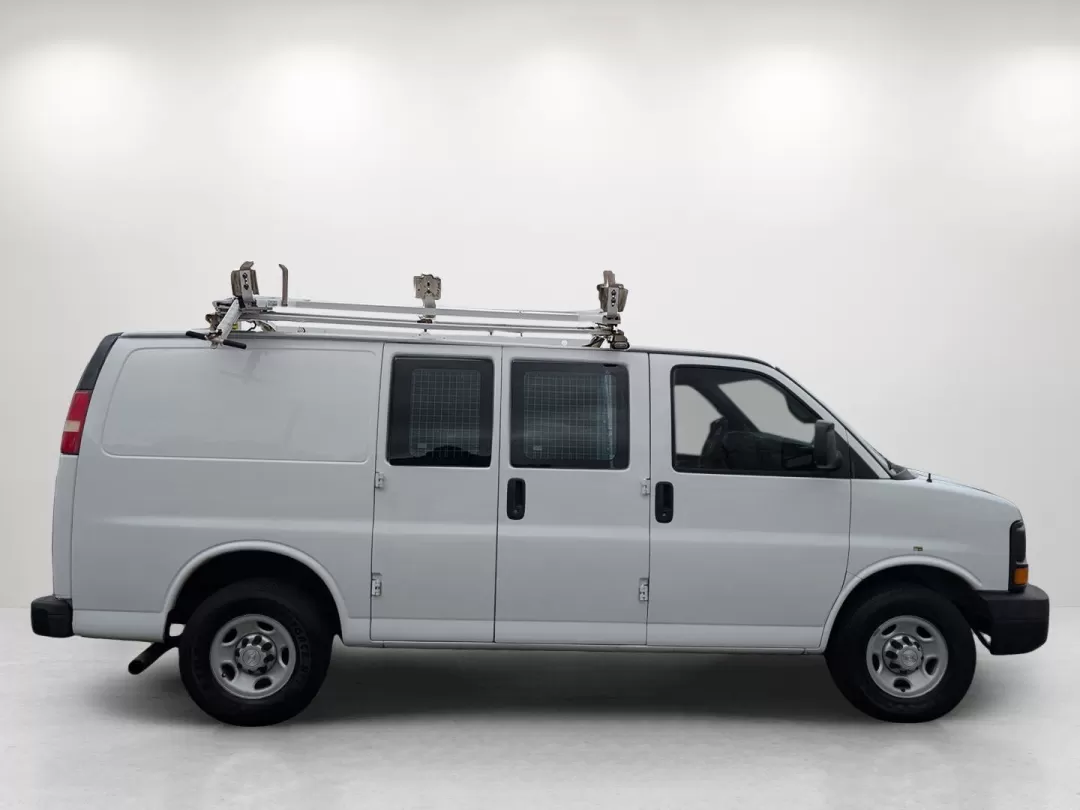2015 /Medium Pewter Chevrolet Express Cargo Van (1GCWGFCF1F1) with an Other engine, located at 3959 U.S. 80 W, Phenix City, AL, 36870, (334) 297-4885, 32.469296, -85.135185 - Are you in the market for a reliable vehicle that can tackle tough jobs while providing you with the comfort and tech features you need? Look no further than this 2015 Chevrolet Express Cargo Van, available at Gils Auto in Phenix City, AL. This full-size cargo van is not just a vehicle; it's a versa - Photo#4