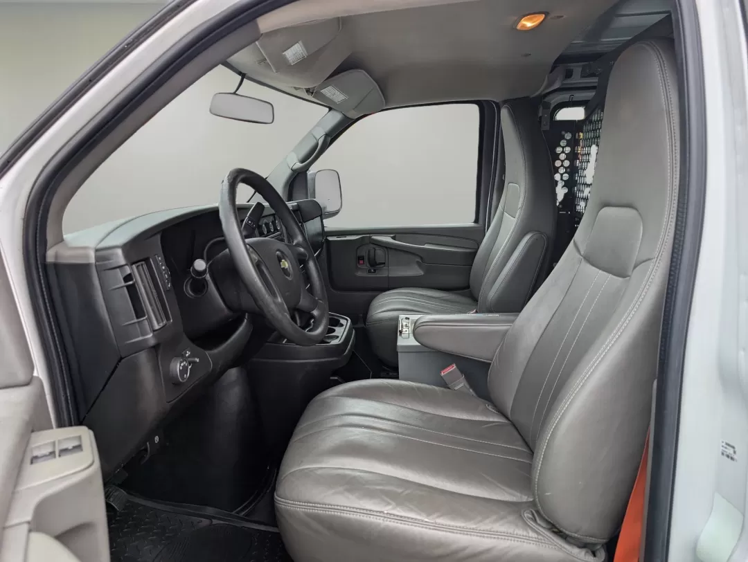 2015 /Medium Pewter Chevrolet Express Cargo Van (1GCWGFCF1F1) with an Other engine, located at 3959 U.S. 80 W, Phenix City, AL, 36870, (334) 297-4885, 32.469296, -85.135185 - Are you in the market for a reliable vehicle that can tackle tough jobs while providing you with the comfort and tech features you need? Look no further than this 2015 Chevrolet Express Cargo Van, available at Gils Auto in Phenix City, AL. This full-size cargo van is not just a vehicle; it's a versa - Photo#10