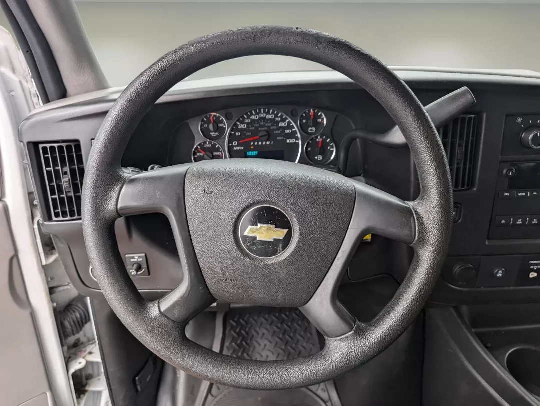 2015 /Medium Pewter Chevrolet Express Cargo Van (1GCWGFCF1F1) with an Other engine, located at 3959 U.S. 80 W, Phenix City, AL, 36870, (334) 297-4885, 32.469296, -85.135185 - Are you in the market for a reliable vehicle that can tackle tough jobs while providing you with the comfort and tech features you need? Look no further than this 2015 Chevrolet Express Cargo Van, available at Gils Auto in Phenix City, AL. This full-size cargo van is not just a vehicle; it's a versa - Photo#17