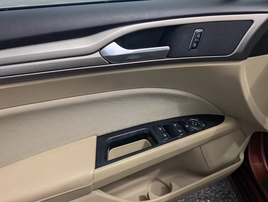 2015 Ford Fusion SE (3FA6P0H76FR) with an Other engine, located at 3959 U.S. 80 W, Phenix City, AL, 36870, (334) 297-4885, 32.469296, -85.135185 - Are you ready for a vehicle that effortlessly blends comfort, style, and practicality? Look no further than this stunning 2015 Ford Fusion SE, a versatile sedan perfect for growing families, daily commuters, or anyone seeking a reliable vehicle for weekend adventures. With a sleek copper exterior an - Photo#8