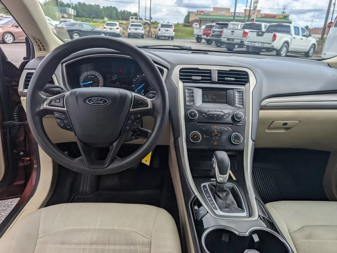 2015 Ford Fusion SE (3FA6P0H76FR) with an Other engine, located at 3959 U.S. 80 W, Phenix City, AL, 36870, (334) 297-4885, 32.469296, -85.135185 - Are you ready for a vehicle that effortlessly blends comfort, style, and practicality? Look no further than this stunning 2015 Ford Fusion SE, a versatile sedan perfect for growing families, daily commuters, or anyone seeking a reliable vehicle for weekend adventures. With a sleek copper exterior an - Photo#11