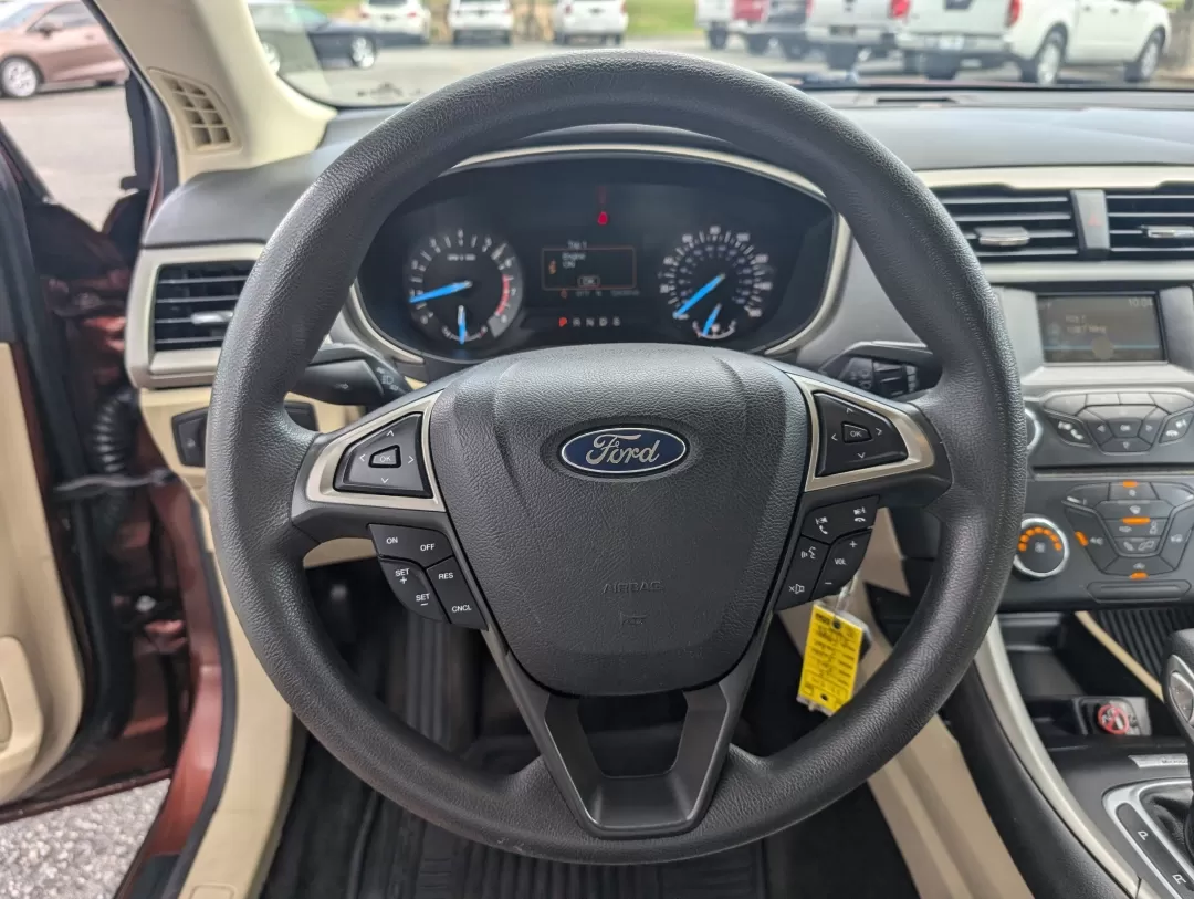 2015 Ford Fusion SE (3FA6P0H76FR) with an Other engine, located at 3959 U.S. 80 W, Phenix City, AL, 36870, (334) 297-4885, 32.469296, -85.135185 - Are you ready for a vehicle that effortlessly blends comfort, style, and practicality? Look no further than this stunning 2015 Ford Fusion SE, a versatile sedan perfect for growing families, daily commuters, or anyone seeking a reliable vehicle for weekend adventures. With a sleek copper exterior an - Photo#12