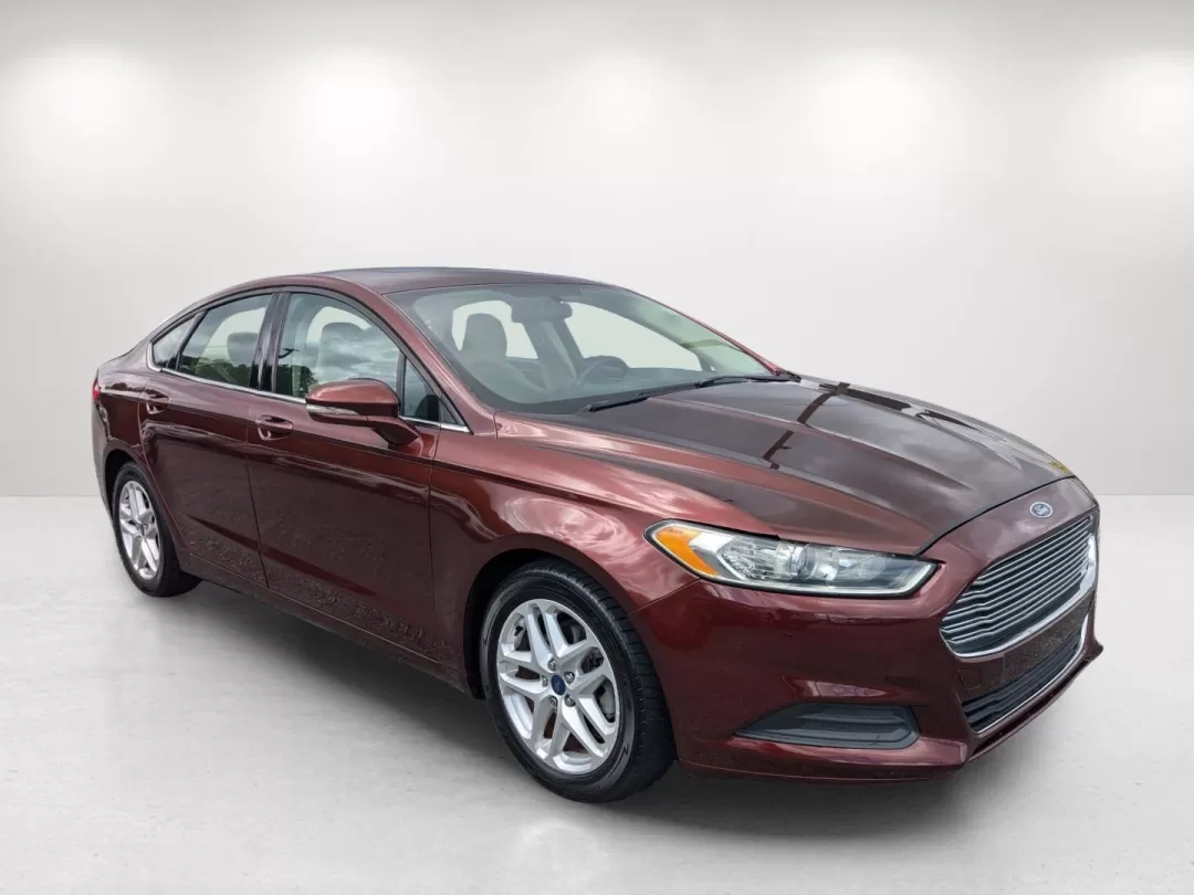 2015 Ford Fusion SE (3FA6P0H76FR) with an Other engine, located at 7000 Northlake Connector, Columbus, GA, 31904, (706) 987-8085, 32.524975, -84.978134 - Are you ready for a vehicle that effortlessly blends comfort, style, and practicality? Look no further than this stunning 2015 Ford Fusion SE, a versatile sedan perfect for growing families, daily commuters, or anyone seeking a reliable vehicle for weekend adventures. With a sleek copper exterior an - Photo#2