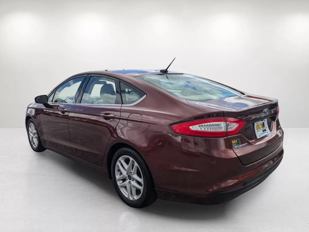 2015 Ford Fusion SE (3FA6P0H76FR) with an Other engine, located at 7000 Northlake Connector, Columbus, GA, 31904, (706) 987-8085, 32.524975, -84.978134 - Are you ready for a vehicle that effortlessly blends comfort, style, and practicality? Look no further than this stunning 2015 Ford Fusion SE, a versatile sedan perfect for growing families, daily commuters, or anyone seeking a reliable vehicle for weekend adventures. With a sleek copper exterior an - Photo#6
