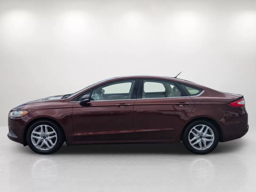2015 Ford Fusion SE (3FA6P0H76FR) with an Other engine, located at 7000 Northlake Connector, Columbus, GA, 31904, (706) 987-8085, 32.524975, -84.978134 - Are you ready for a vehicle that effortlessly blends comfort, style, and practicality? Look no further than this stunning 2015 Ford Fusion SE, a versatile sedan perfect for growing families, daily commuters, or anyone seeking a reliable vehicle for weekend adventures. With a sleek copper exterior an - Photo#7