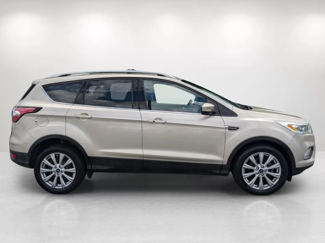 2017 Ford Escape Titanium (1FMCU0JDXHU) with an Other engine, located at 3959 U.S. 80 W, Phenix City, AL, 36870, (334) 297-4885, 32.469296, -85.135185 - Experience the freedom of the open road with the 2017 Ford Escape Titanium, a versatile and stylish SUV that's perfect for your next family adventure or daily commute. Designed for those who seek comfort, reliability, and advanced technology, this vehicle is ideal for growing families, budget-consci - Photo#3