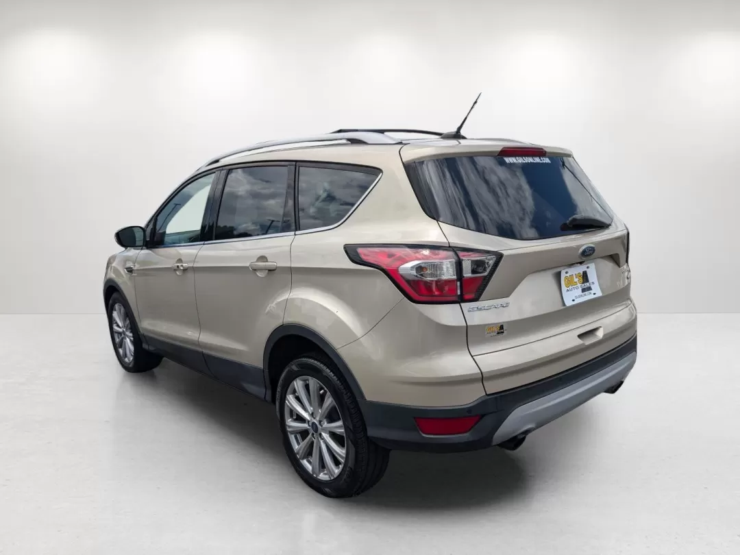 2017 Ford Escape Titanium (1FMCU0JDXHU) with an Other engine, located at 3959 U.S. 80 W, Phenix City, AL, 36870, (334) 297-4885, 32.469296, -85.135185 - Experience the freedom of the open road with the 2017 Ford Escape Titanium, a versatile and stylish SUV that's perfect for your next family adventure or daily commute. Designed for those who seek comfort, reliability, and advanced technology, this vehicle is ideal for growing families, budget-consci - Photo#6