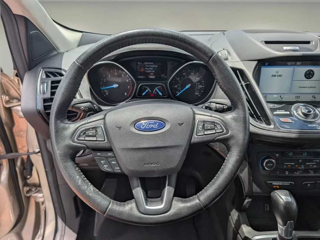 2017 Ford Escape Titanium (1FMCU0JDXHU) with an Other engine, located at 3959 U.S. 80 W, Phenix City, AL, 36870, (334) 297-4885, 32.469296, -85.135185 - Experience the freedom of the open road with the 2017 Ford Escape Titanium, a versatile and stylish SUV that's perfect for your next family adventure or daily commute. Designed for those who seek comfort, reliability, and advanced technology, this vehicle is ideal for growing families, budget-consci - Photo#14