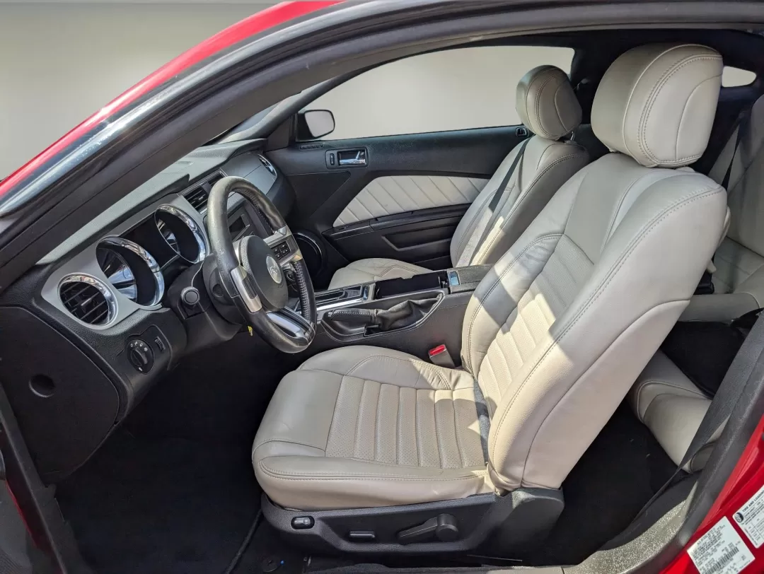 2013 Ford Mustang (1ZVBP8AM2D5) with an Other engine, located at 1430 Gateway Drive, Opelika, AL, 36801, (334) 239-0944, 32.637871, -85.409790 - Experience the thrill of the open road with the 2013 Ford Mustang a perfect blend of style, power, and affordability. Whether you're a weekend warrior seeking adventure or a daily commuter looking to make your drive more exciting, this striking maroon coupe brings a blend of performance and comfort - Photo#9