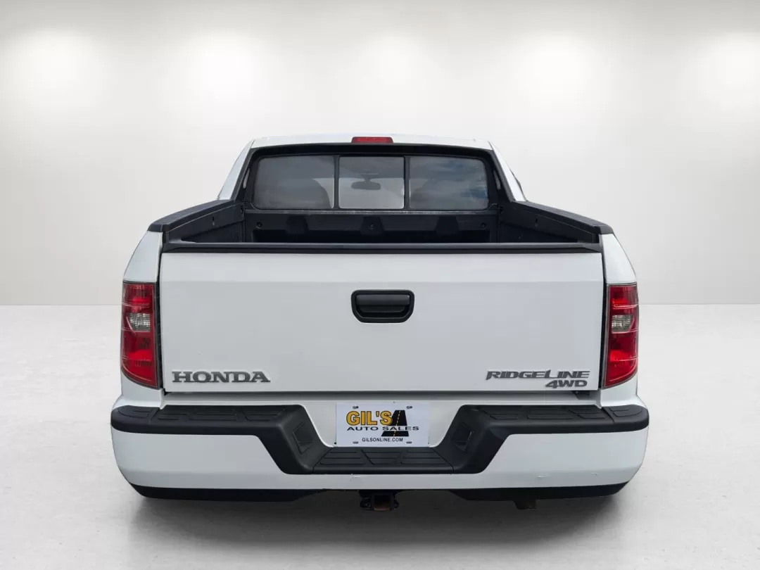 2011 Honda Ridgeline RT (5FPYK1F28BB) with an Other engine, located at 3959 U.S. 80 W, Phenix City, AL, 36870, (334) 297-4885, 32.469296, -85.135185 - Elevate your adventures with the 2011 Honda Ridgeline RT, the ultimate crew cab pickup truck that seamlessly blends versatility and comfort for a lifestyle filled with possibilities. Whether you're hauling equipment for a weekend project, embarking on family road trips, or navigating daily commutes, - Photo#5