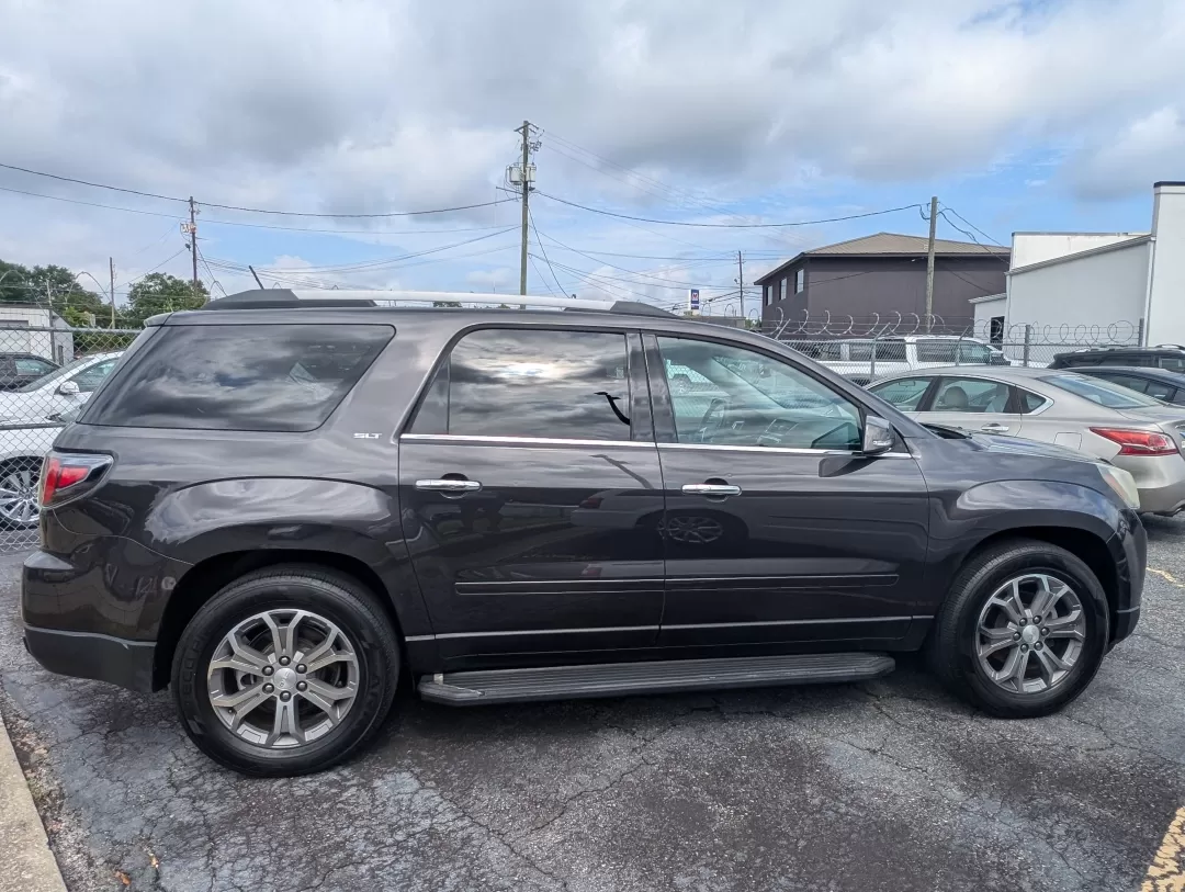 2014 /Ebony GMC Acadia SLT (1GKKRRKD5EJ) with an Other engine, located at 3959 U.S. 80 W, Phenix City, AL, 36870, (334) 297-4885, 32.469296, -85.135185 - **Discover Your Next Adventure with This 2014 GMC Acadia SLT!**<br /> <br /> Are you searching for the perfect vehicle to transport your family, friends, or gear on your next weekend getaway or long commute? Look no further! The 2014 GMC Acadia SLT is the ultimate SUV designed for comfortable travel - Photo#3