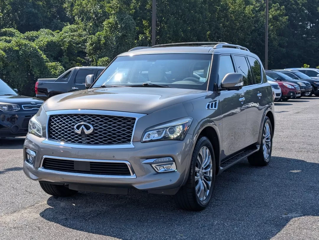 2015 /Wheat Infiniti QX80 (JN8AZ2NF4F9) with an Other engine, located at 3959 U.S. 80 W, Phenix City, AL, 36870, (334) 297-4885, 32.469296, -85.135185 - ### Experience Luxury and Versatility with the 2015 Infiniti QX80 at Gils Auto<br /> <br /> Looking for a vehicle that perfectly blends luxury with practicality? Meet the 2015 Infiniti QX80, available now at Gils Auto in Phenix City, AL. This stunning SUV is not just a mode of transportation; it's a - Photo#0