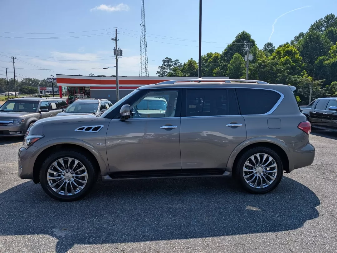 2015 /Wheat Infiniti QX80 (JN8AZ2NF4F9) with an Other engine, located at 3959 U.S. 80 W, Phenix City, AL, 36870, (334) 297-4885, 32.469296, -85.135185 - ### Experience Luxury and Versatility with the 2015 Infiniti QX80 at Gils Auto<br /> <br /> Looking for a vehicle that perfectly blends luxury with practicality? Meet the 2015 Infiniti QX80, available now at Gils Auto in Phenix City, AL. This stunning SUV is not just a mode of transportation; it's a - Photo#7