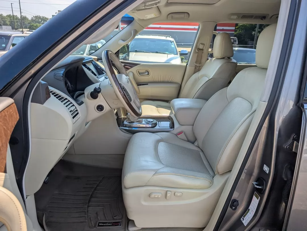 2015 /Wheat Infiniti QX80 (JN8AZ2NF4F9) with an Other engine, located at 3959 U.S. 80 W, Phenix City, AL, 36870, (334) 297-4885, 32.469296, -85.135185 - ### Experience Luxury and Versatility with the 2015 Infiniti QX80 at Gils Auto<br /> <br /> Looking for a vehicle that perfectly blends luxury with practicality? Meet the 2015 Infiniti QX80, available now at Gils Auto in Phenix City, AL. This stunning SUV is not just a mode of transportation; it's a - Photo#9