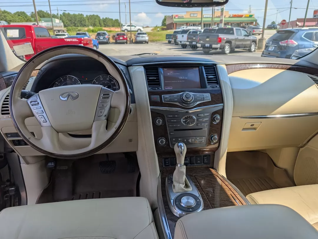 2015 /Wheat Infiniti QX80 (JN8AZ2NF4F9) with an Other engine, located at 3959 U.S. 80 W, Phenix City, AL, 36870, (334) 297-4885, 32.469296, -85.135185 - ### Experience Luxury and Versatility with the 2015 Infiniti QX80 at Gils Auto<br /> <br /> Looking for a vehicle that perfectly blends luxury with practicality? Meet the 2015 Infiniti QX80, available now at Gils Auto in Phenix City, AL. This stunning SUV is not just a mode of transportation; it's a - Photo#12
