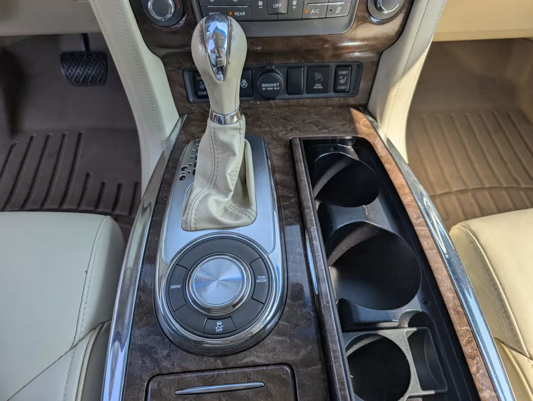 2015 /Wheat Infiniti QX80 (JN8AZ2NF4F9) with an Other engine, located at 3959 U.S. 80 W, Phenix City, AL, 36870, (334) 297-4885, 32.469296, -85.135185 - ### Experience Luxury and Versatility with the 2015 Infiniti QX80 at Gils Auto<br /> <br /> Looking for a vehicle that perfectly blends luxury with practicality? Meet the 2015 Infiniti QX80, available now at Gils Auto in Phenix City, AL. This stunning SUV is not just a mode of transportation; it's a - Photo#13