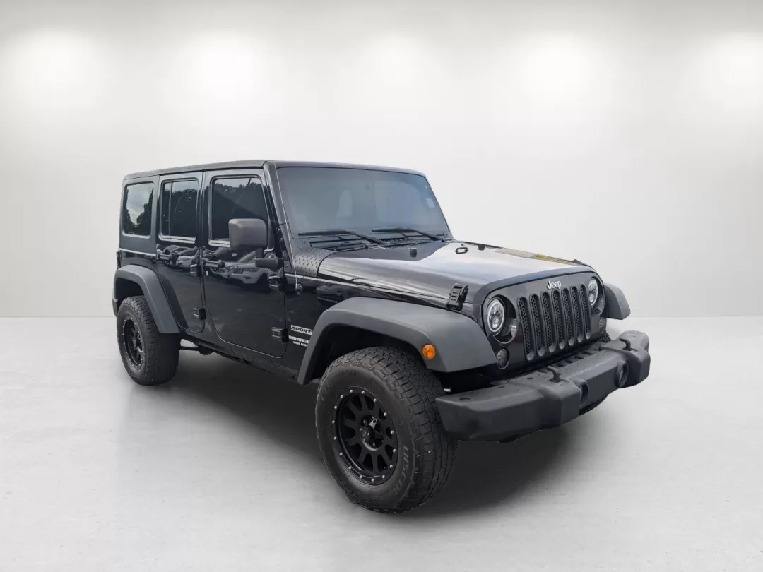 2013 /Black Interior Jeep Wrangler Sport (1C4BJWDG5DL) with an Other engine, located at 3959 U.S. 80 W, Phenix City, AL, 36870, (334) 297-4885, 32.469296, -85.135185 - Are you seeking the ultimate adventure vehicle that balances rugged capability with everyday usability? Look no further than this 2013 Jeep Wrangler Sport, proudly presented by Gils Auto, your trusted Buy Here Pay Here dealership located at 3959 U.S. 80 W, Phenix City, AL 36870. Ideal for weekend ex - Photo#2