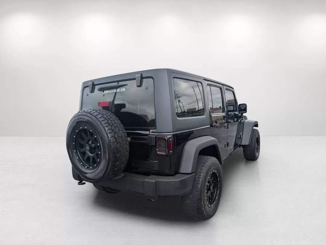 2013 /Black Interior Jeep Wrangler Sport (1C4BJWDG5DL) with an Other engine, located at 3959 U.S. 80 W, Phenix City, AL, 36870, (334) 297-4885, 32.469296, -85.135185 - Are you seeking the ultimate adventure vehicle that balances rugged capability with everyday usability? Look no further than this 2013 Jeep Wrangler Sport, proudly presented by Gils Auto, your trusted Buy Here Pay Here dealership located at 3959 U.S. 80 W, Phenix City, AL 36870. Ideal for weekend ex - Photo#4