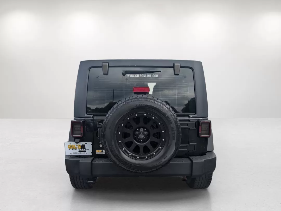 2013 /Black Interior Jeep Wrangler Sport (1C4BJWDG5DL) with an Other engine, located at 3959 U.S. 80 W, Phenix City, AL, 36870, (334) 297-4885, 32.469296, -85.135185 - Are you seeking the ultimate adventure vehicle that balances rugged capability with everyday usability? Look no further than this 2013 Jeep Wrangler Sport, proudly presented by Gils Auto, your trusted Buy Here Pay Here dealership located at 3959 U.S. 80 W, Phenix City, AL 36870. Ideal for weekend ex - Photo#5