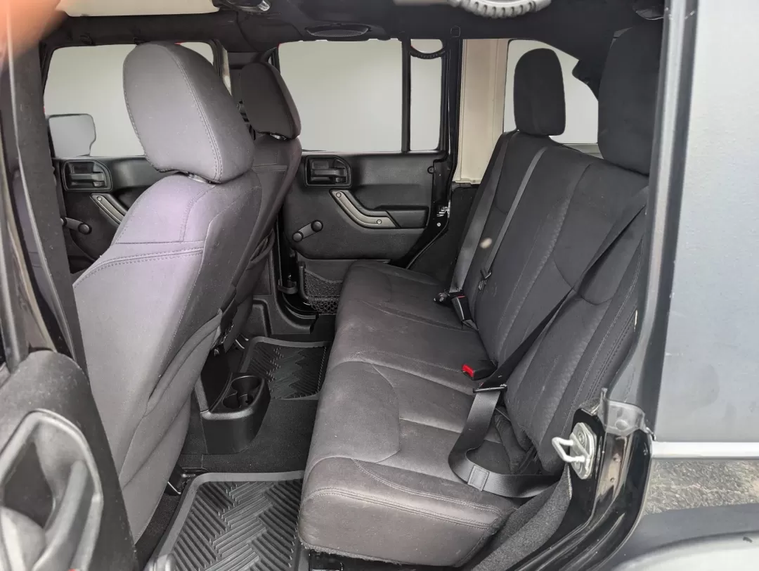 2013 /Black Interior Jeep Wrangler Sport (1C4BJWDG5DL) with an Other engine, located at 1430 Gateway Drive, Opelika, AL, 36801, (334) 239-0944, 32.637871, -85.409790 - Are you seeking the ultimate adventure vehicle that balances rugged capability with everyday usability? Look no further than this 2013 Jeep Wrangler Sport, proudly presented by Gils Auto, your trusted Buy Here Pay Here dealership located at 3959 U.S. 80 W, Phenix City, AL 36870. Ideal for weekend ex - Photo#10