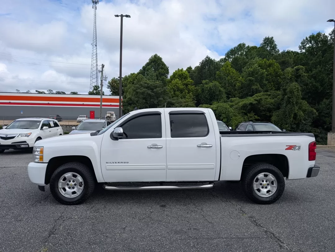 2013 /Light Cashmere/Dark Cashmere Chevrolet Silverado 1500 LT (3GCPKSE75DG) with an Other engine, located at 3959 U.S. 80 W, Phenix City, AL, 36870, (334) 297-4885, 32.469296, -85.135185 - **Elevate Your Adventures with the 2013 Chevrolet Silverado 1500 LT at Gils Auto in Phenix City, AL!**<br /> <br /> Are you ready to take your weekend getaways or daily commutes to the next level? The 2013 Chevrolet Silverado 1500 LT is the perfect companion for those who value reliability and perfo - Photo#7