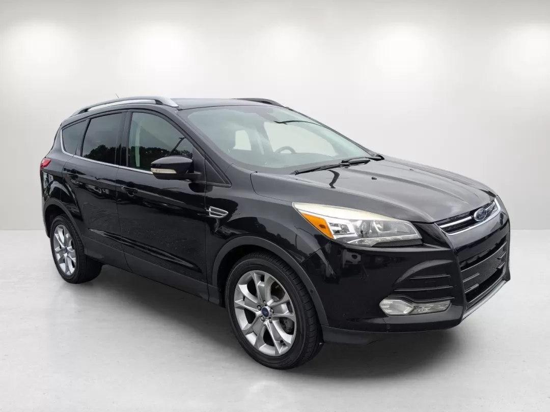 2014 Ford Escape Titanium (1FMCU0JX9EU) with an Other engine, located at 3959 U.S. 80 W, Phenix City, AL, 36870, (334) 297-4885, 32.469296, -85.135185 - Discover the perfect balance of style, comfort, and versatility with the 2014 Ford Escape Titanium available at Gils Auto in Phenix City, AL. Whether you're a busy parent juggling activities, a commuter navigating the daily grind, or an adventure-seeker ready to hit the road, this SUV is designed to - Photo#2