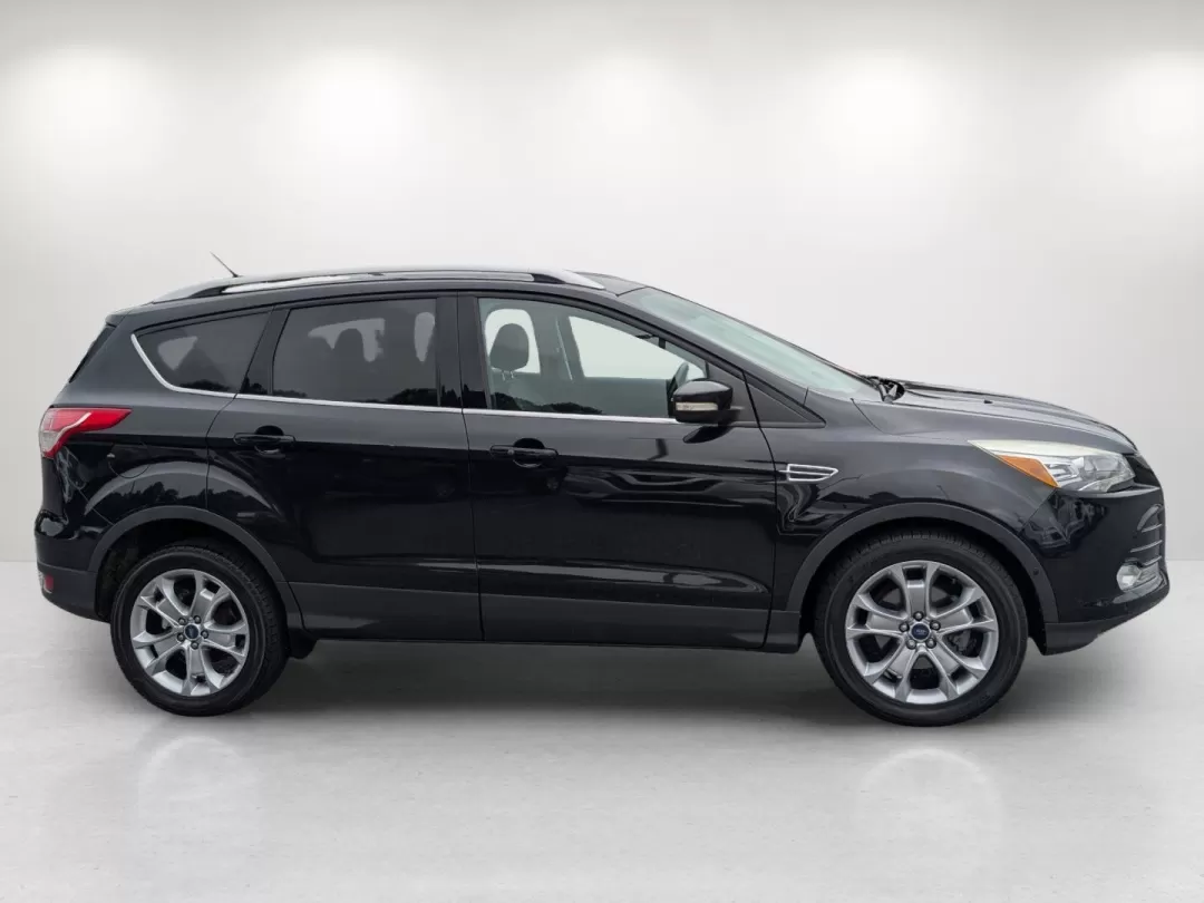 2014 Ford Escape Titanium (1FMCU0JX9EU) with an Other engine, located at 3959 U.S. 80 W, Phenix City, AL, 36870, (334) 297-4885, 32.469296, -85.135185 - Discover the perfect balance of style, comfort, and versatility with the 2014 Ford Escape Titanium available at Gils Auto in Phenix City, AL. Whether you're a busy parent juggling activities, a commuter navigating the daily grind, or an adventure-seeker ready to hit the road, this SUV is designed to - Photo#3