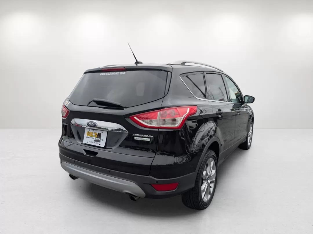 2014 Ford Escape Titanium (1FMCU0JX9EU) with an Other engine, located at 3959 U.S. 80 W, Phenix City, AL, 36870, (334) 297-4885, 32.469296, -85.135185 - Discover the perfect balance of style, comfort, and versatility with the 2014 Ford Escape Titanium available at Gils Auto in Phenix City, AL. Whether you're a busy parent juggling activities, a commuter navigating the daily grind, or an adventure-seeker ready to hit the road, this SUV is designed to - Photo#4