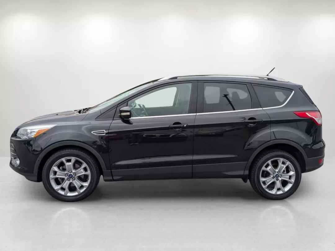 2014 Ford Escape Titanium (1FMCU0JX9EU) with an Other engine, located at 3959 U.S. 80 W, Phenix City, AL, 36870, (334) 297-4885, 32.469296, -85.135185 - Discover the perfect balance of style, comfort, and versatility with the 2014 Ford Escape Titanium available at Gils Auto in Phenix City, AL. Whether you're a busy parent juggling activities, a commuter navigating the daily grind, or an adventure-seeker ready to hit the road, this SUV is designed to - Photo#7